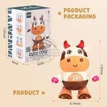 Brinquedos musicais da dança do bebê da vaca do brinquedo da dança do bebê com música e luzes . Brinquedos musicais da dança do bebê da vaca do brinquedo da dança do bebê com música e luzes .