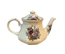 Bule em Porcelana Elegância com Detalhes Delicados