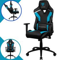 Cadeira Gamer ThunderX3 TC3 Azure Cor Preta e Azul Com Almofada Ergonômica Para Lombar e Apoio de Pescoço e Braço Bidirecional Suporta Até 120Kg