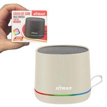 Caixa De Som Bluetooth Fm Rgb Portátil Xtrad 10W Creme Caixa De Som Bluetooth Fm Rgb Portátil Xtrad 10W Creme