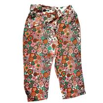Calça Beta - estampa floral com amarração na frente.