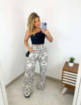 Calça branca e preta + blusa preta