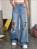 Calça clara com rasco Calça clara com rasco