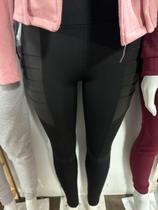Calça feminina com elastano e material sintético