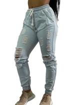 Calça Feminina Jeans Jogger C/ Elástico Rasgada Blogueira C35 - Fanáticos Por Cintas