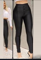 Calça feminina material sintético Calça feminina material sintético