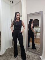 Calça Flare preta em suede Calça Flare preta em suede