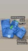 Calça Flare rasgada Calça Flare rasgada