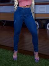 Calça jeans classica feminina clara puida rasgada com levanta bumbum destoryer Calça jeans classica feminina clara puida rasgada com levanta bumbum destoryer