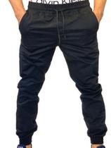 calça jeans jogger masculina jeans rasgado, sarja com elastico e bolso