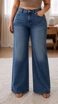 Calça Jeans Plus size Modelo Wid leg, Flare Com Elastano Moda Feminina 23 Graus Cor:Jeans-MédioTamanho:44 Calça Jeans Plus size Modelo Wid leg, Flare Com Elastano Moda Feminina 23 Graus Cor:Jeans-MédioTamanho:44