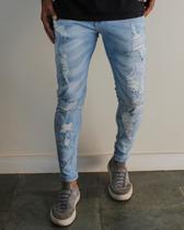 Calça jeans skinny rasgada delave laser - creed jeans
