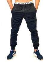 Calça jogger masculina jeans rasgado slim em sarja camuflado com elastano