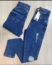 Calça skiny lavagem escura tamanho 40