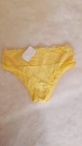 Calcinha microfibra na cor amarelo Calcinha microfibra na cor amarelo