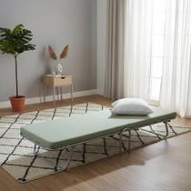Cama para viagem dobrável.