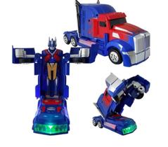 Caminhão Transformers Optimus Prime Pilha Vira Robô Som Luz - KING