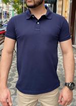 Camisa polo azul marinho Rocha store