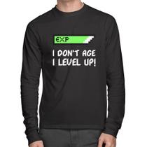 Camiseta Algodão I Don't Age, I Level Up Manga Longa - Foca na Moda