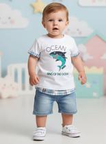 Camiseta bebê com detalhe em tecido estilo sobreposição