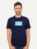Camiseta Calvin Klein Jeans Masculina Issue Logo Light Block Azul Marinho Camiseta Calvin Klein Jeans Masculina Issue Logo Light Block Azul Marinho