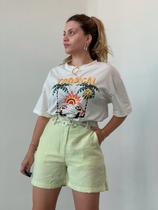Camiseta Feminina Oversized com Estampa Frontal Tropical Tainá