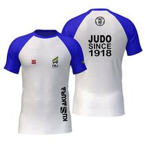 Camiseta Judo KuSakura CBJ Branca/Azul - KuSakura Brasil/MKS Camiseta Judo KuSakura CBJ Branca/Azul - KuSakura Brasil/MKS
