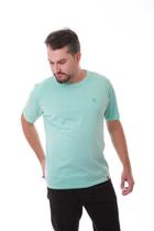 Camiseta Masculina Estonada Verde Água Estampa Logomarca Lateral Camiseta Masculina Estonada Verde Água Estampa Logomarca Lateral
