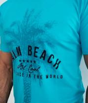 Camiseta Masculina Palm Beach Azul Turquesa com Estampa de uma Palmeira no Peito Alinhada ao corpo Produzido com Algodão Egípicio Camiseta Masculina Palm Beach Azul Turquesa com Estampa de uma Palmeira no Peito Alinhada ao corpo Produzido com Algodão Egípicio