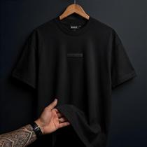 Camiseta MCD Box Fit Division Preta - Estilo Urbano e Conforto Camiseta MCD Box Fit Division Preta - Estilo Urbano e Conforto