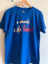 Camiseta o MUNDO É DE TODES