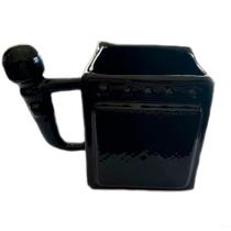 Caneca de cerâmica microfone e caixa de som preto