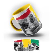 Caneca de Porcelana Guiné Pontos Turísticos 325 ml. Caneca de Porcelana Guiné Pontos Turísticos 325 ml.