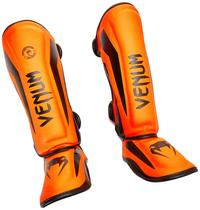 Canilleras Venum Kids Elite Neo Naranja Talla Pequeña 3-5 Años Canilleras Venum Kids Elite Neo Naranja Talla Pequeña 3-5 Años