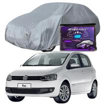 Capa Cobrir Carro FOX 100% Forrada Armada Force 100% Impermeável Forro Total Protege Sol Chuva Poeira Lona Proteção Automotiva Hatch e Sedan