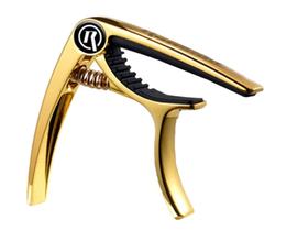 Capotraste ronsani p/ violão nylon deluxe pro-r gold 1008