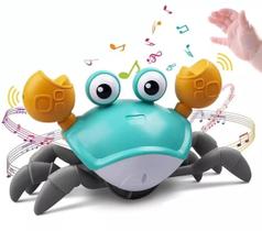 Caranguejo de Brinquedo Musical Fujão Sensor Desvia de Obstáculo Com Som