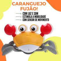 Caranguejo Fujão Recarregável com Sensor Música e Luz Som Bateria USB