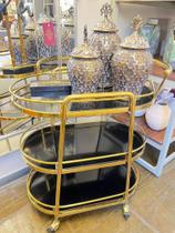 Carrinho Bar Oval 03 andares Metal dourado Base Fundo Preto Carrinho Bar Oval 03 andares Metal dourado Base Fundo Preto
