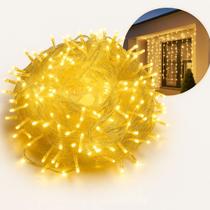 Cascata de Luzes Pisca Pisca LED Natalina 4,3m 240 Leds Branco Quente 8 Funções Fio Transparente 220 e 110V Decoração de Natal Interna e Externa