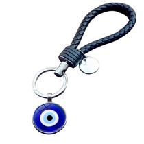 Chaveiro azul turco Evil Eye com cordão de couro tecido à mão