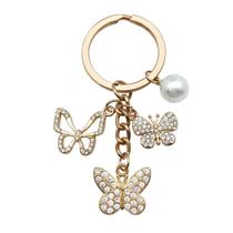 Chaveiro: borboleta elegante com pérola e strass