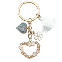 Chaveiro com borla de coração branco com design de flores e pérolas Chaveiro com borla de coração branco com design de flores e pérolas