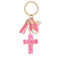 Chaveiro Creative Pink Resin Cross com borboleta e borla