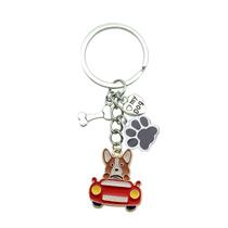 Chaveiro Cute Dog Driving Corgi I Drive com estampa de osso e pata Chaveiro Cute Dog Driving Corgi I Drive com estampa de osso e pata