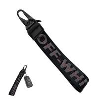 Chaveiro DXNQ Chaveiro de carro com cordão de pulso em tecido preto Chaveiro DXNQ Chaveiro de carro com cordão de pulso em tecido preto