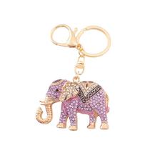 Chaveiro: elefante roxo, strass, liga dourada, elegante