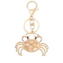 Chaveiro Elegant Crab com pedras de olho de gato e strass