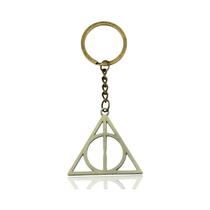 Chaveiro Harry Potter Plataforma 9 3/4 - Snitch Dourado em Modelo de Boneca