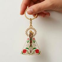 Chaveiro Nossa Senhora de Nazaré Resplendor Cravejado Dourado Religioso Decorativo em Metal Resistente para Uso Diário Chaveiro Nossa Senhora de Nazaré Resplendor Cravejado Dourado Religioso Decorativo em Metal Resistente para Uso Diário